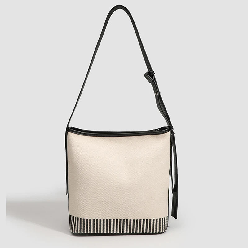 Women's Fashionable Summer 2025 New Large Capacity High-end Canva Spliced Lightweight Commuting Single Shoulder Bucket Bag